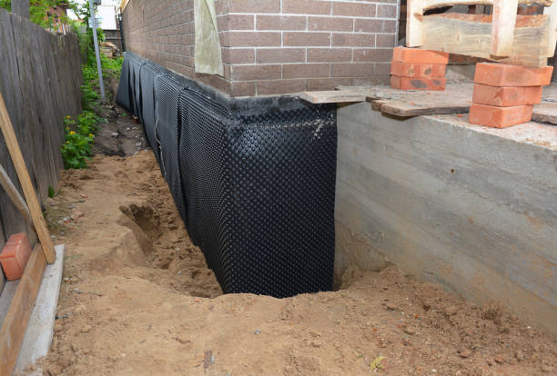 Happy homeowners after waterproofing job in Gwynedd Valley